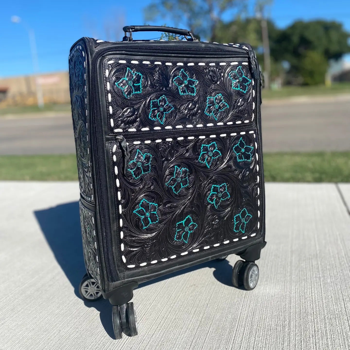 Black Floral Tooled Leather Rolling Luggage